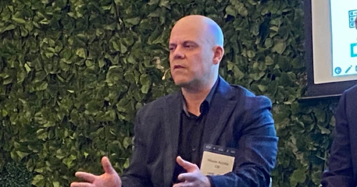 Moses Acosta speaking on an enterprise technology leadership panel in New York.